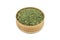 Chopped tarragon leaves in a wooden dish