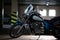 A chopper motorcycle silhouette. Motorbike standing in dark underground garage