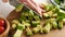 Chopping avocado with chef knife