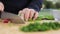 Chopping green beets in portions