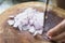 Chopping shallots on cutting board