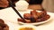 Chopsticks eating Hong Kong honey barbecue roasted prok