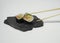 chopsticks grabing a piece of sushi from a sushi blackboard plate
