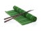 Chopsticks over bamboo mat