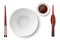 Chopsticks and plates. Realistic white empty dish. Asian restaurant serving. Porcelain bowl. Soy sauce. Japanese or