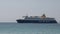 CHORA, MYKONOS, GREECE- SEPTEMBER,15, 2016: medium view as a blue star ferry arrives at the island of mykonos