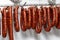 Chorizos cured and hung in strings