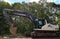 Chorlu, Turkey - September 24, 2022: Turkish crawler excavator Hidromek parked on a road near Chorlu