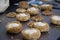 Choux dough with craquelin on a table.