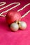 Chrisrmas tree decoration. A close up of a red and gold christmas tree decorations on red background. Christmas ball and