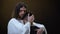 Christ hugging depressed parishioner looking in camera, God kindness, protection