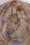 Christ pantocrator rises his right hand, an ancient romanesque m