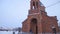 The Christian Church in winter. Famous Saint Gregory Tigran Honents church is surrounded with winter landscape. The