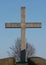 Christian cross, crucifix, stone with blue sky