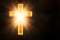 Christian cross with lights, bokeh on black background. Copy space. Faith symbol. Church worship, salvation concept