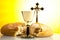 Christian holy communion, bright background, saturated concept