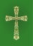 Christian ornate cross with floral gold pattern on green background