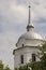 Christian orthodox white church with silver domes and gold crosses