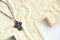 Christian plaster cross and silver cross on chains on a white background close-up, love of god