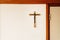 Christian religious crucifix on the wall of a hospital room