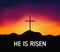Christian religious design for Easter celebration, Saviour cross on dramatic sunrise scene, with text He is risen