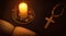 Christian spiritual environment for praying with candle illuminating objects