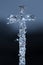 Christian stone cross that breaks into many pieces, glows and dark background. 3d render image
