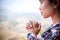 Christian woman  hands praying to god with morning,  Woman Pray for god blessing to wishing have a better life. Christian life