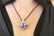 Christian woman wearing Holy Spirit pendant necklace