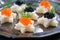 Christmas appetizers with bread and caviar, close-up