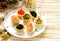 Christmas appetizers. Small tartlets with caviar and pate.