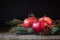 Christmas apples with cinnamon and badyan with branches of Christmas-tree