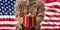 Christmas in the army. Christmas ball and gift box on an American military uniform