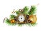 Christmas arrangement with clock, decorations and green pine twigs