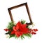 Christmas arrangement with red poinsettia flower , berries, cones, golden ribbons and a wooden frame isolated on white