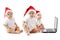 Christmas babies with laptop