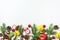 Christmas Background Background with Fir Branches Red Apples Citrus Cones Candy Canes Red Christmass Balls and Small Red Alarm