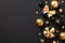 Christmas background with black and golden balls, gift boxes, confetti. Luxury, chic style. Premium New Year greeting card