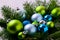 Christmas background with blue and green ornaments