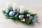 Christmas background with blue ornaments decorated candleholder