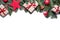 Christmas background border at the top with fir branches and other decorations presents red stars and bulbs with copy space on