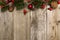 Christmas background of branches on wood