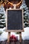 Christmas background with chalkboard, Christmas tree and snowfall.