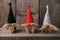 Christmas background. Christmas handcraft decorations gnome dwarfs vintage chest of drawers. Christmas card. Selective focus. Clos