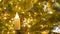 Christmas Background. Composition with fir branches, electric burning candle and christmas ball