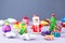 Christmas background with decorations. Santa, Christmas train with tree and sweets, snowman, reindeer and gifts