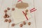 Christmas background.Envelopes with golden acorns.White wooden table