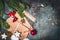 Christmas background with festive gifts packaging, cookies and decoration, top view