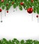 Christmas background with fir branches and balls.