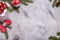 Christmas background with fir branches, pinecones, ribbons